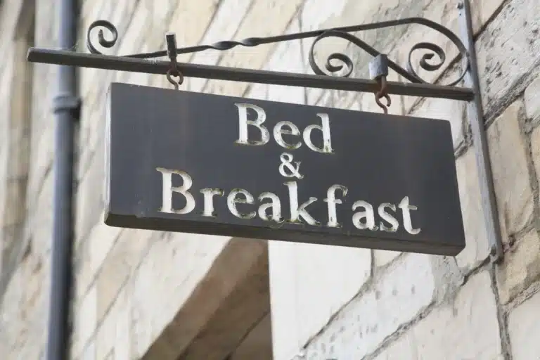 bed and breakfast sign front of an accommodation